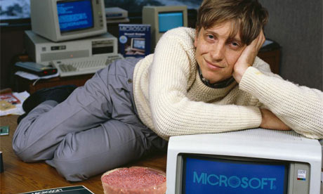 Two great hunks of man-meat!  It's Bill Gates with some lab-grown beef.  
